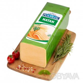 
Созревший сыр голландского типа с характерным оранжевым цветом и мягким вкусом.. . фото 1