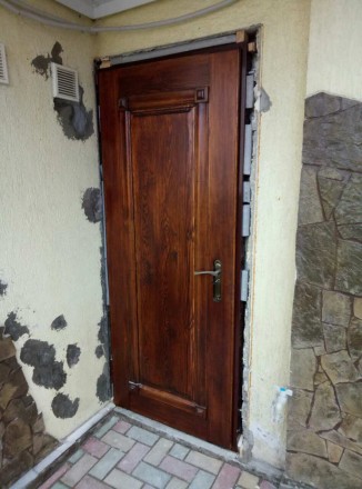 Металлические входные двери с деревянной накладкой. Утепленние бальзатовай ватой. . фото 5