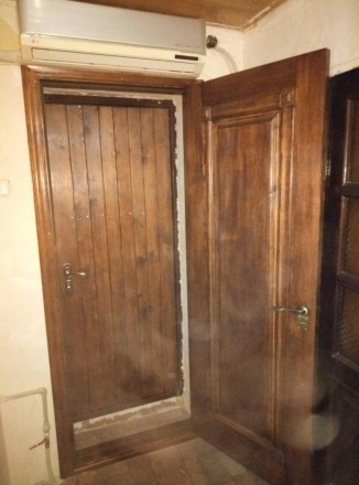 Металлические входные двери с деревянной накладкой. Утепленние бальзатовай ватой. . фото 7
