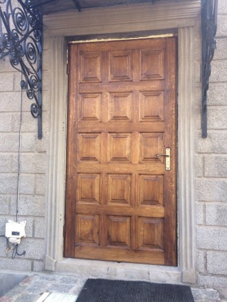 Металлические входные двери с деревянной накладкой. Утепленние бальзатовай ватой. . фото 3