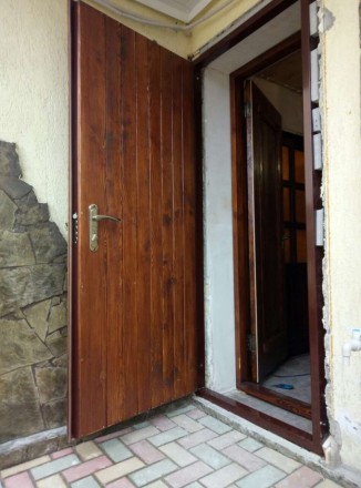Металлические входные двери с деревянной накладкой. Утепленние бальзатовай ватой. . фото 8