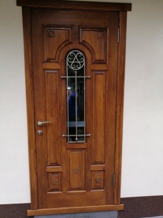 Металлические входные двери с деревянной накладкой. Утепленние бальзатовай ватой. . фото 2