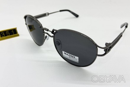Cолнцезащитные очки овальные с поляризацией черные линзы в металлической оправе
. . фото 1