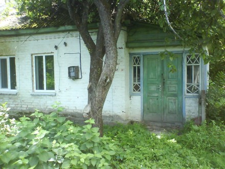 Деревянный дом обложен кирпичем на 2 выхода (4 комнаты, 2 веранды) общей площадь. . фото 2