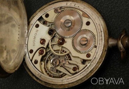 Срочно Продам старинные карманные часы Nomos
( с живым балансом https://www.you. . фото 1