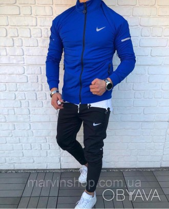 
Спортивный костюм мужской весна-осень синий чёрный без капюшона Nike (Найк)
Муж. . фото 1