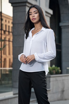 
Элегантная блуза выполненная из легкой шифоновой ткани. Блуза свободного кроя, . . фото 2