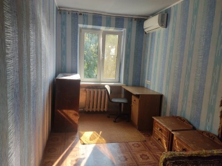 Квартира находится на ул Янгеля , с раздельными комнатами, косметический ремонт,. Титова. фото 9