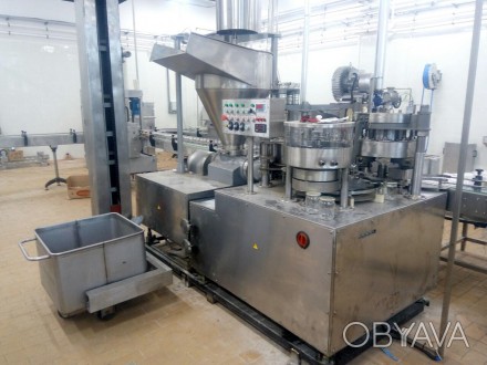 Автомат для наповнення банок м'ясом призначений для виробництва консервів типу ". . фото 1