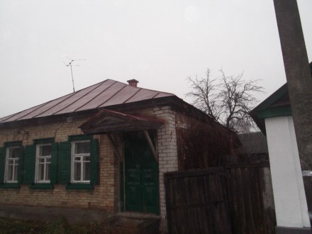 Дом расположен возле реки Десна в городе Остер Черниговской области. Дом деревян. . фото 4