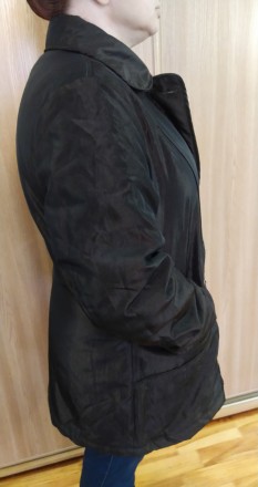 Продам добротную новую демисезонную женскую куртку.

Размер ХХL (50 евро.) или. . фото 4