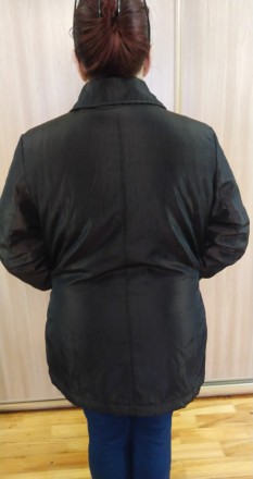 Продам добротную новую демисезонную женскую куртку.

Размер ХХL (50 евро.) или. . фото 5
