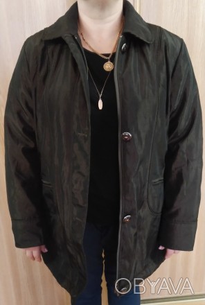 Продам добротную новую демисезонную женскую куртку.

Размер ХХL (50 евро.) или. . фото 1
