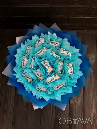 Букет с конфетами Шарм с сине-голубых тонах.
В букете 16 конфет.
Размер букета и. . фото 1