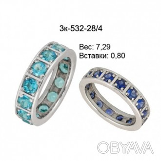 Золотое кольцо с голубыми топазами к-532-28/4