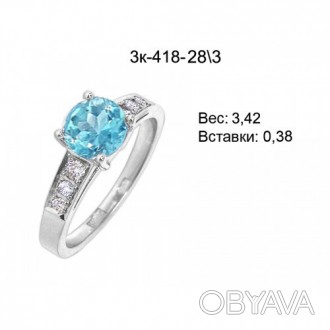 Золотое кольцо с голубым топазом к-418-28/3