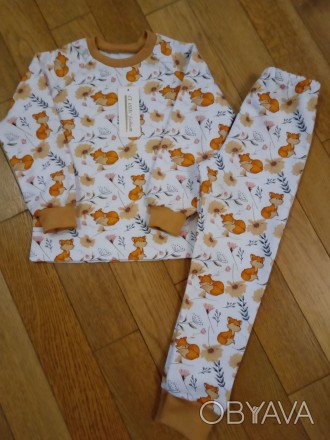 Гарненька піжамка з милими лисичками для ваших донечок.
Тканина трикотаж 100% б. . фото 1