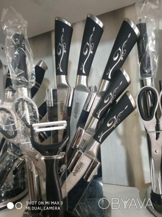 
Набір кухонних ножів, на 8 предметів із підставкою + ножиці Benson BN-403
 
Наб. . фото 1