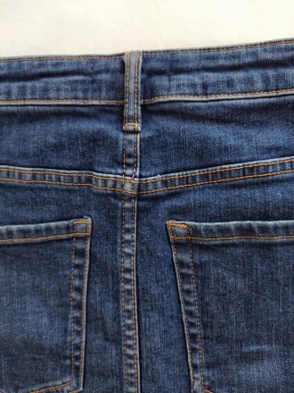 Синяя джинсовая мини юбочка классического прямого покроя от популярного испанско. . фото 13