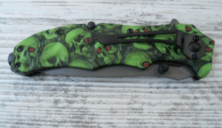 Складной нож Magnum Hades Rescue имеет необычную красивую рукоять с рисунком из . . фото 5