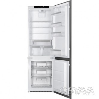 Комбинированный холодильник SMEG C 8174 N 3 E выполнен в классическом белом цвет. . фото 1