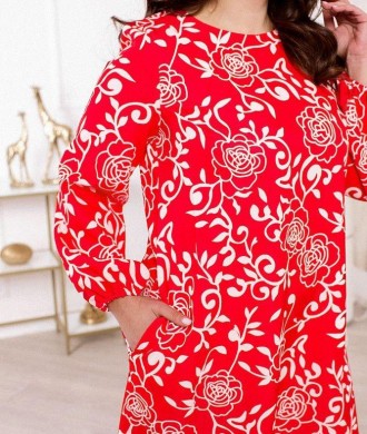 Витончене плаття А-силуету, виконане з тканини з яскравим квітковим принтом, доз. . фото 4