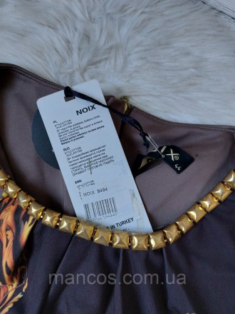 Нарядное платье Noix коричневое с цветочным принтом
новое
Размер по бирке 44,реа. . фото 5
