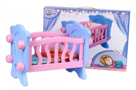 Яркая кроватка, выполненная в розовом и голубом цветах, понравится каждой девочк. . фото 3
