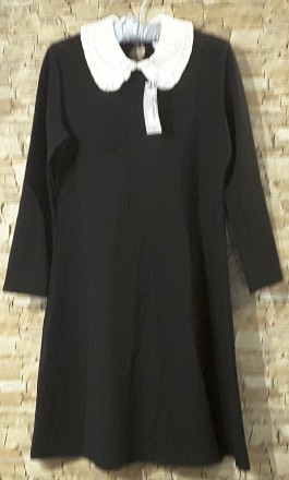 Черное платье с белым воротником – это один из лучших примеров не сдающей . . фото 2