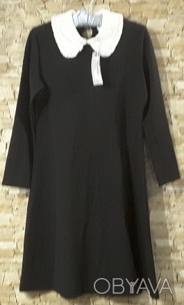 Черное платье с белым воротником – это один из лучших примеров не сдающей . . фото 1