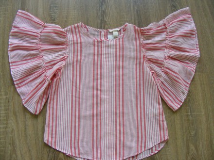 Легка, нарядна блузка з широкими рукавами
Бренд H&M
Прямий крій
На спинці. . фото 2