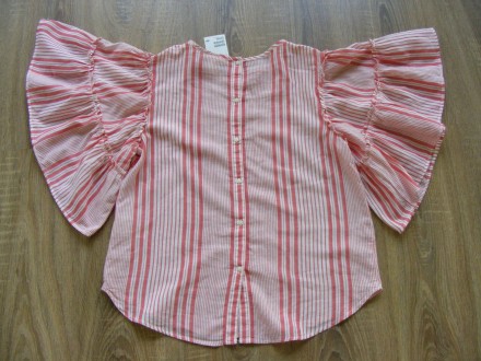 Легка, нарядна блузка з широкими рукавами
Бренд H&M
Прямий крій
На спинці. . фото 3