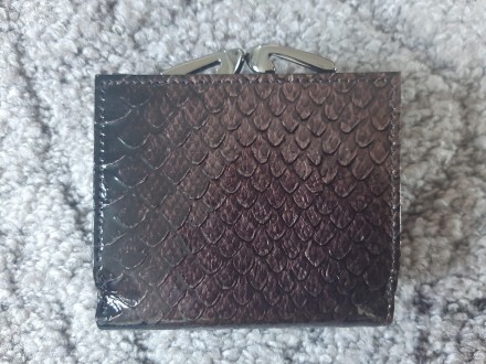 Кожаный женский кошелек dr.koffer (стилизация под змею)

Отличное качество

. . фото 3