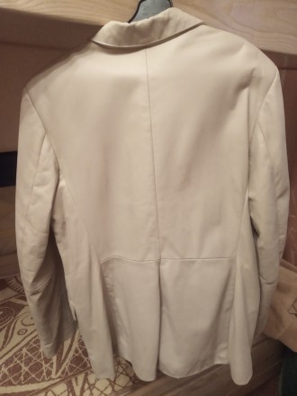 пиджак кожаный женский

цвет бежевый
размер 44-46
рукав 61
плечи 44
объем . . фото 4