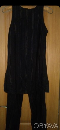 Элегантный  лёгкий чёрный в блестящую полоску костюм- двойка made in CYPRUS, раз. . фото 1