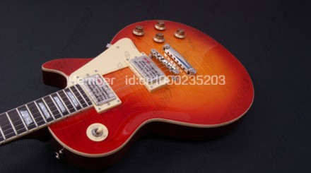 Электрогитара Gibson Les Paul Standard Heritage Cherry Sunburst. С логотипом Gib. . фото 6