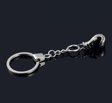 Оригінальний цинковий брелок для ключів у формі боксерської рукавички.
	Матеріал. . фото 4