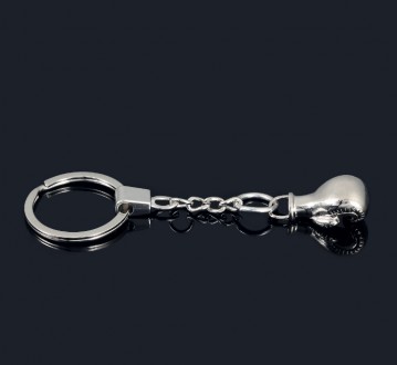 Оригінальний цинковий брелок для ключів у формі боксерської рукавички.
	Матеріал. . фото 7