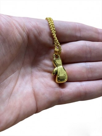 Оригінальний цинковий брелок для ключів у формі боксерської рукавички.
 
	Матері. . фото 8