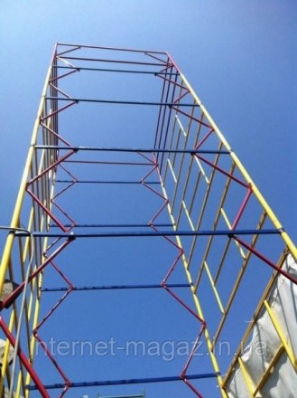 Вышка-тура - это конструкция башенного типа на колесах, которая является мобильн. . фото 2