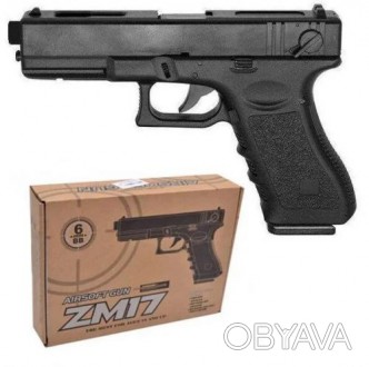 Металлический пистолет ZM17, стреляющий пульками, которые прилагаются к набору.У. . фото 1