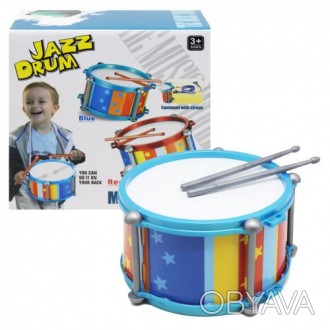 Яркий детский барабан с ремешком. У барабана есть 2 игровые стенки. В комплекте . . фото 1