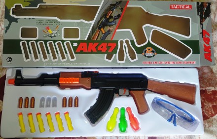 Автомат іграшковий 600-101— це яскрава та стильна іграшкова зброя.
Виготовлений . . фото 2