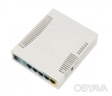 5-портовая Wi-Fi маршрутизатор. RouterOS L4, CPU 600 МГц, RAM 128 Мб. Порты: 4x . . фото 1