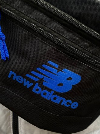 
 
 Поясная сумка бананка New Balance:
- Размер: 26* 41* 18 см;
- Материал: Оксф. . фото 5