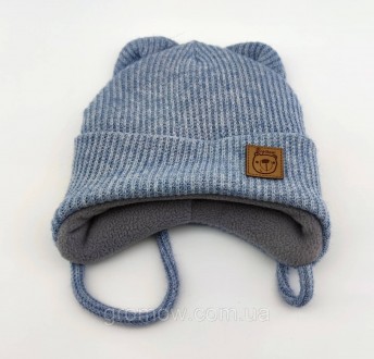 
Тёплая вязаная детская шапка на завязках. Очень приятная, мягкая и тёплая ткань. . фото 3