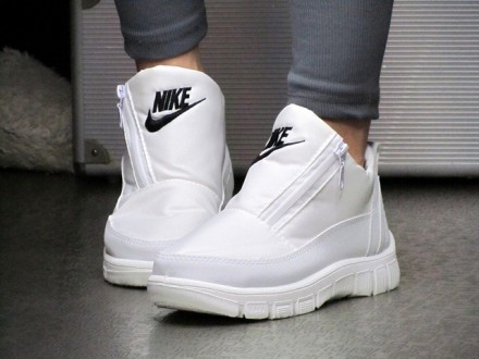 
Женские белые короткие Дутики Nike зимние
р.36,37
Размер в размер
36-23.5 см
37. . фото 8