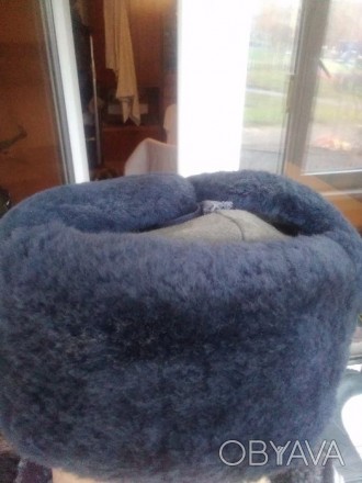 Продам нову зимову шапку-вушанку з натуральної цигейки (овчина) 55-56 розміру. М. . фото 1