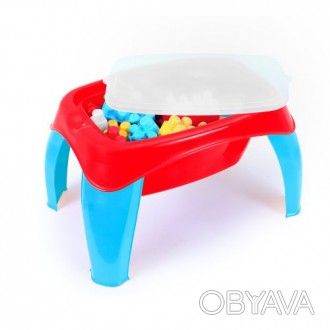 Игрушечный столик с конструктором. Изготовлен из высококачественного пластика. В. . фото 1