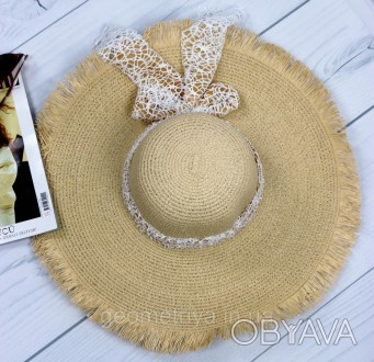 Летняя женская шляпа молочного цвета с бантом
Новая классическая модель шляпы с . . фото 1